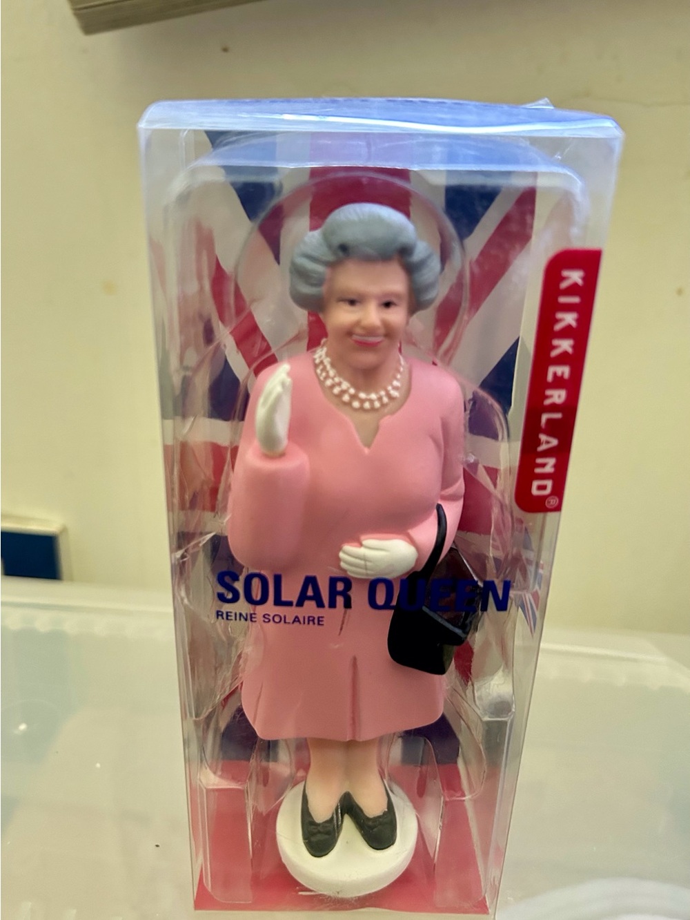 Kikkerland Solar Queen Figurine Waving - Pink Dress, Tribute to Queen Elizabeth.